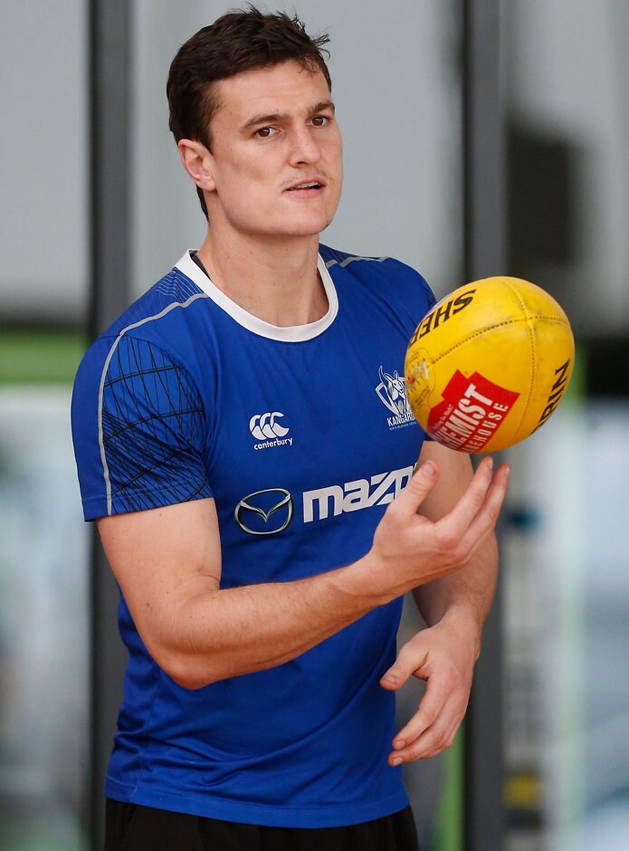 AFL 2015 Training - North Melbourne 150915 MELBOURNE, AUSTRALIA - SEPTEMBER 15: Scott Thompson of the Kangaroos looks on during the North Melbourne Kangaroos training session at Arden Street, Melbourne on September 15, 2015. (Photo: Adam Trafford/AFL Media)